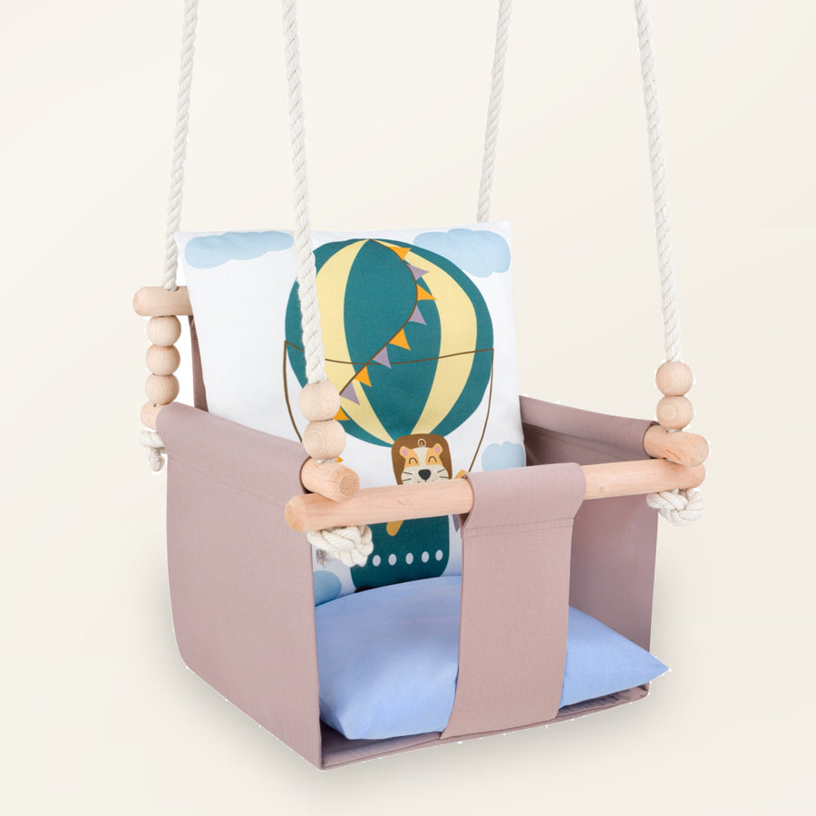 Babygynge med løve-motiv - set forfra